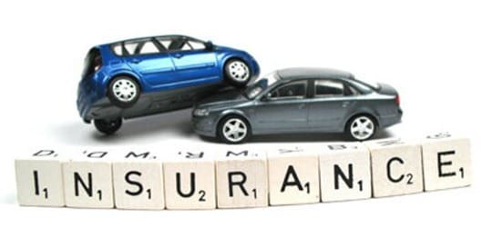 Insurance scrabble pieces with 2 cars ad