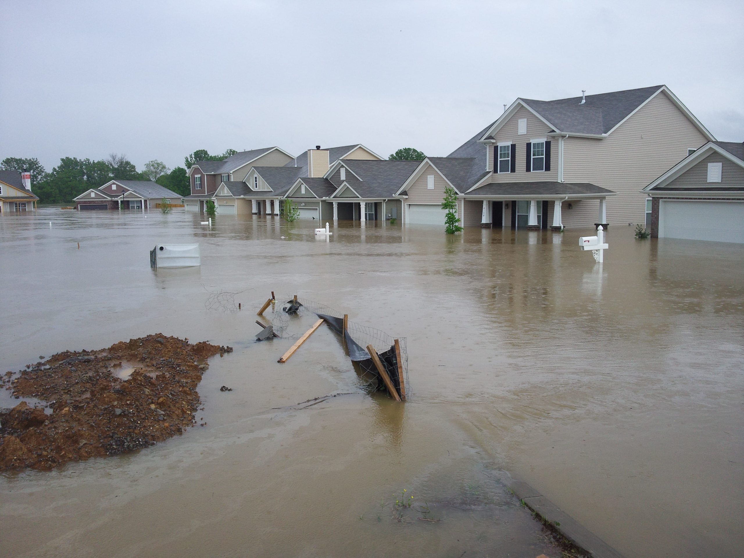 Damage homes outside after a flood