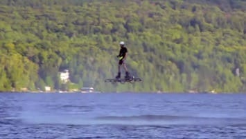 World record hover boarder takes off over a body of water