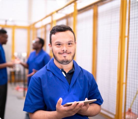 employee holding digital tablet at workplace