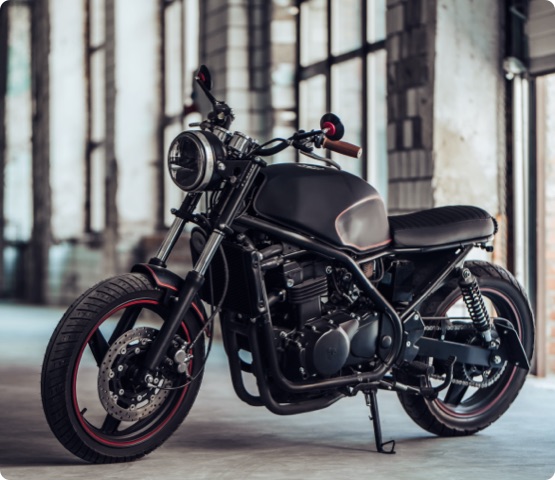 Modern black motorcycle in garage. Cafe racer.
