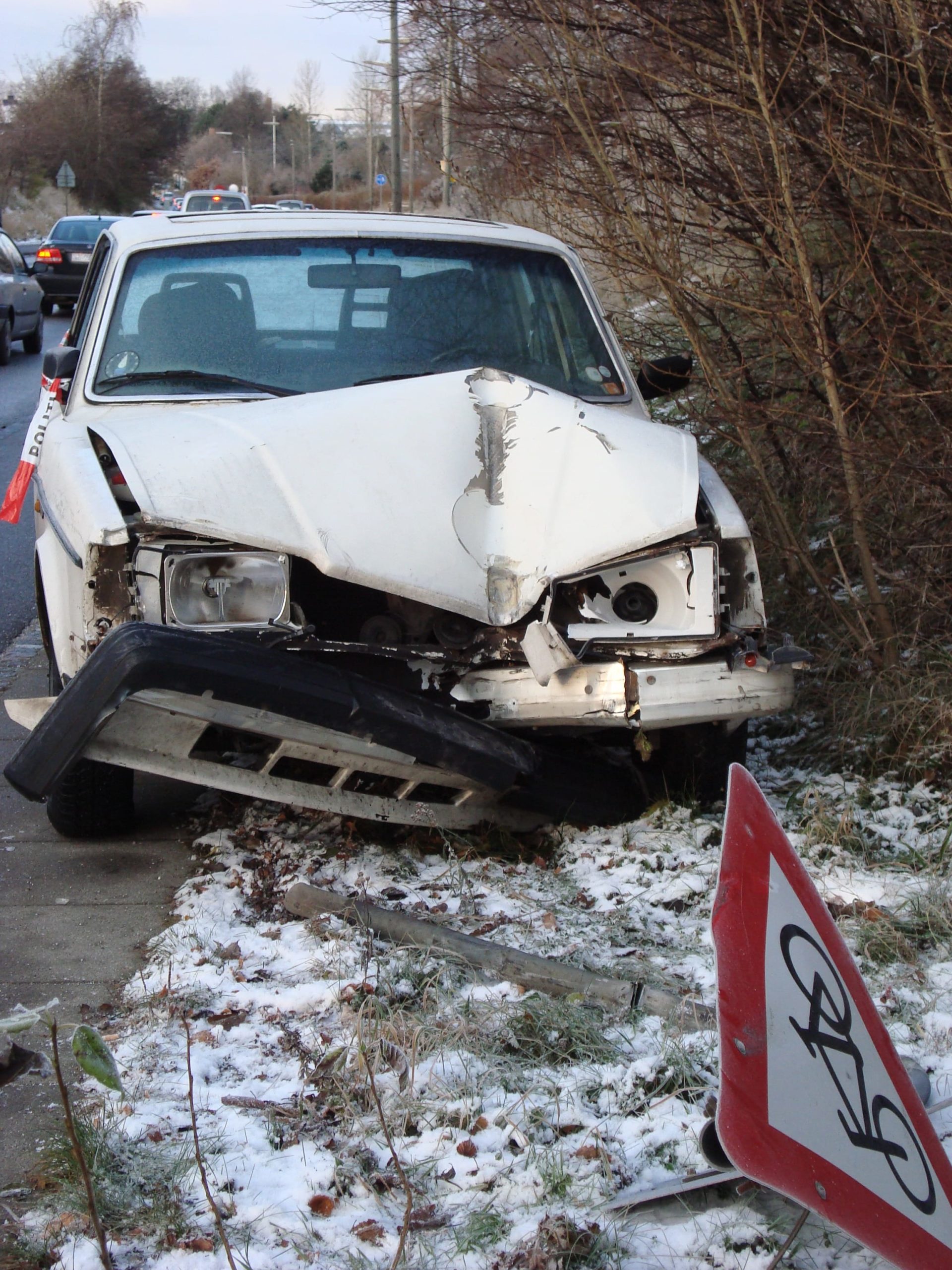 Damaged front-end of car