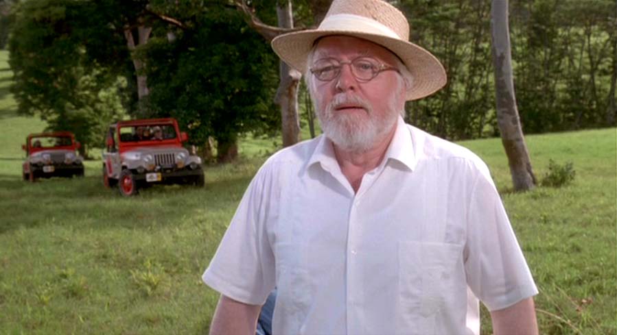 John Hammond outside with cars in background