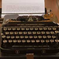 Typewriter sitting on a desk