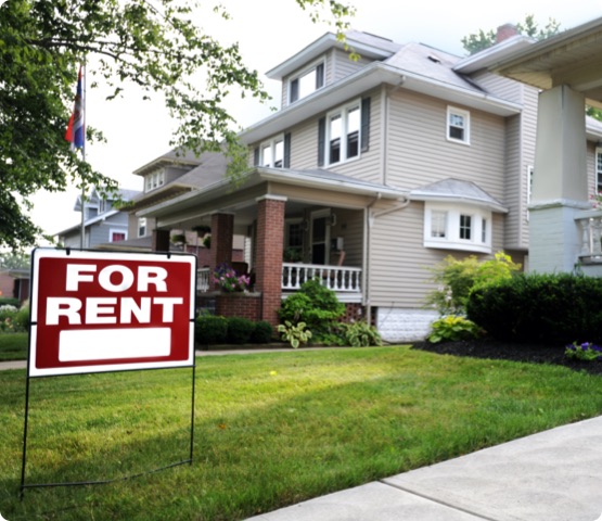 Home For Rent Sign in Front of Beautiful American Home