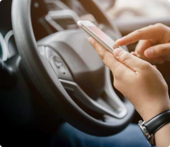 close up driver woman hand holding smartphone
