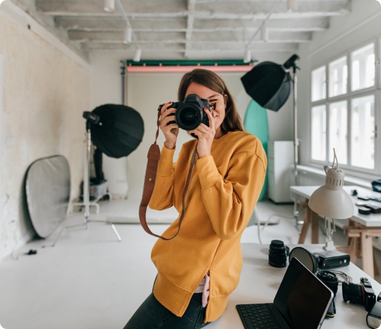 Photographer working in a studio