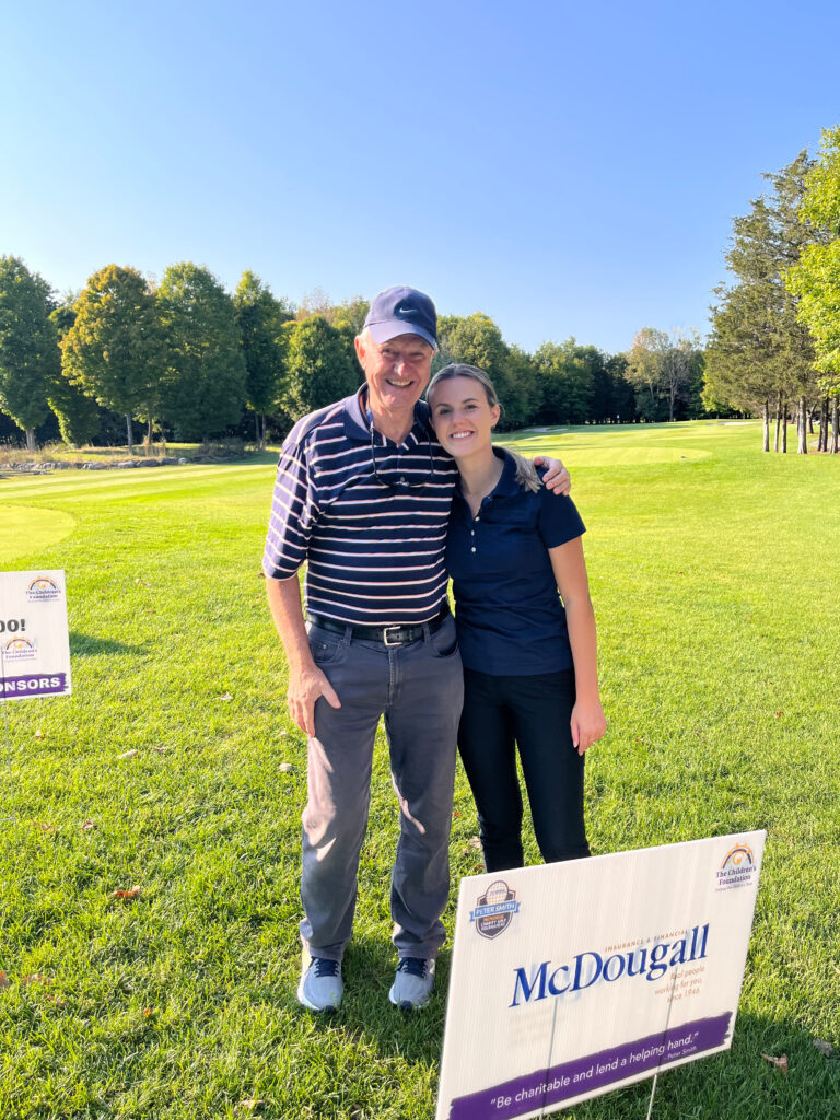 Erin Hough and her dad Earl golfing