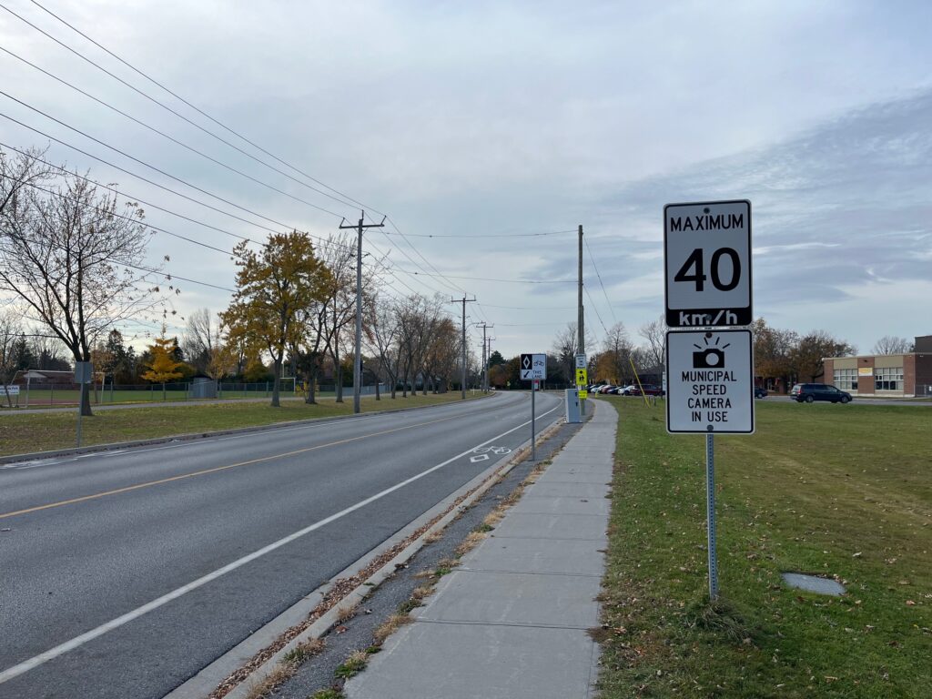 speeding camera sign